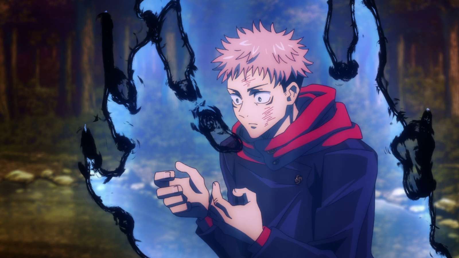 yuji regarde ses mains en étant entouré de flammes bleutées dans jujutsu kaisen